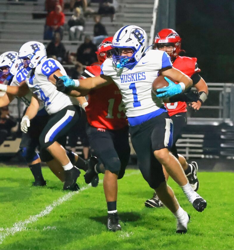 Huskies storm back to top Bellaire